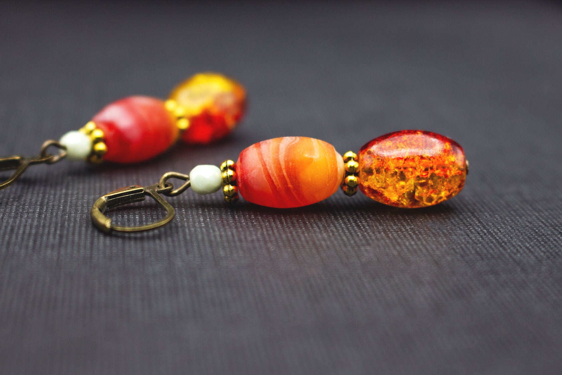 Ohrringe in Gelb, Rot und Orange mit Lava Glasperlen – ausdrucksstarker Ohrschmuck